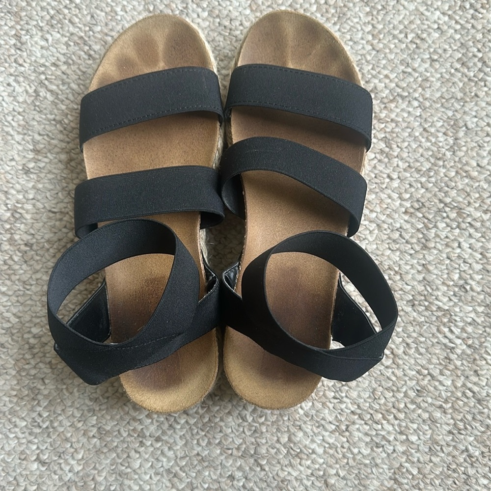 Black Steve Maden platform shoes.